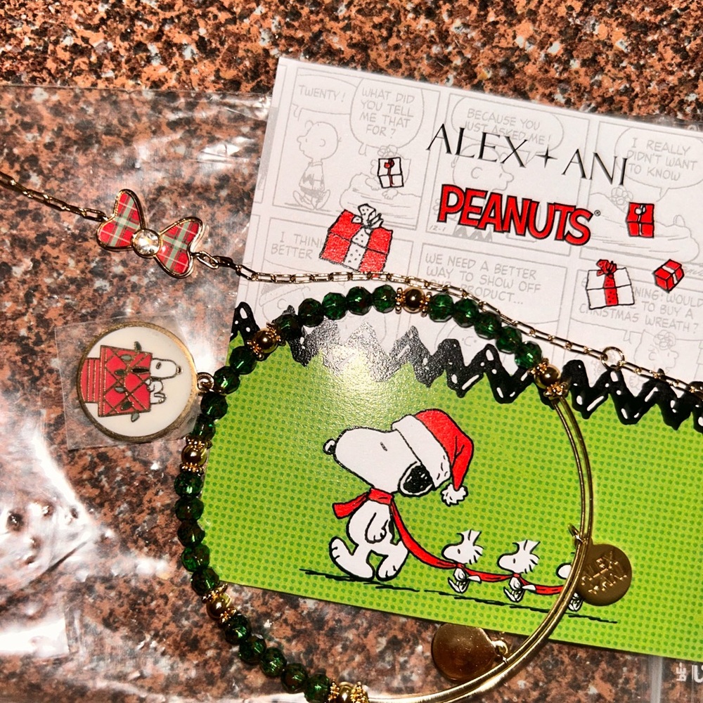 Alex and Ani Green and Gold Snoopy bracelets
